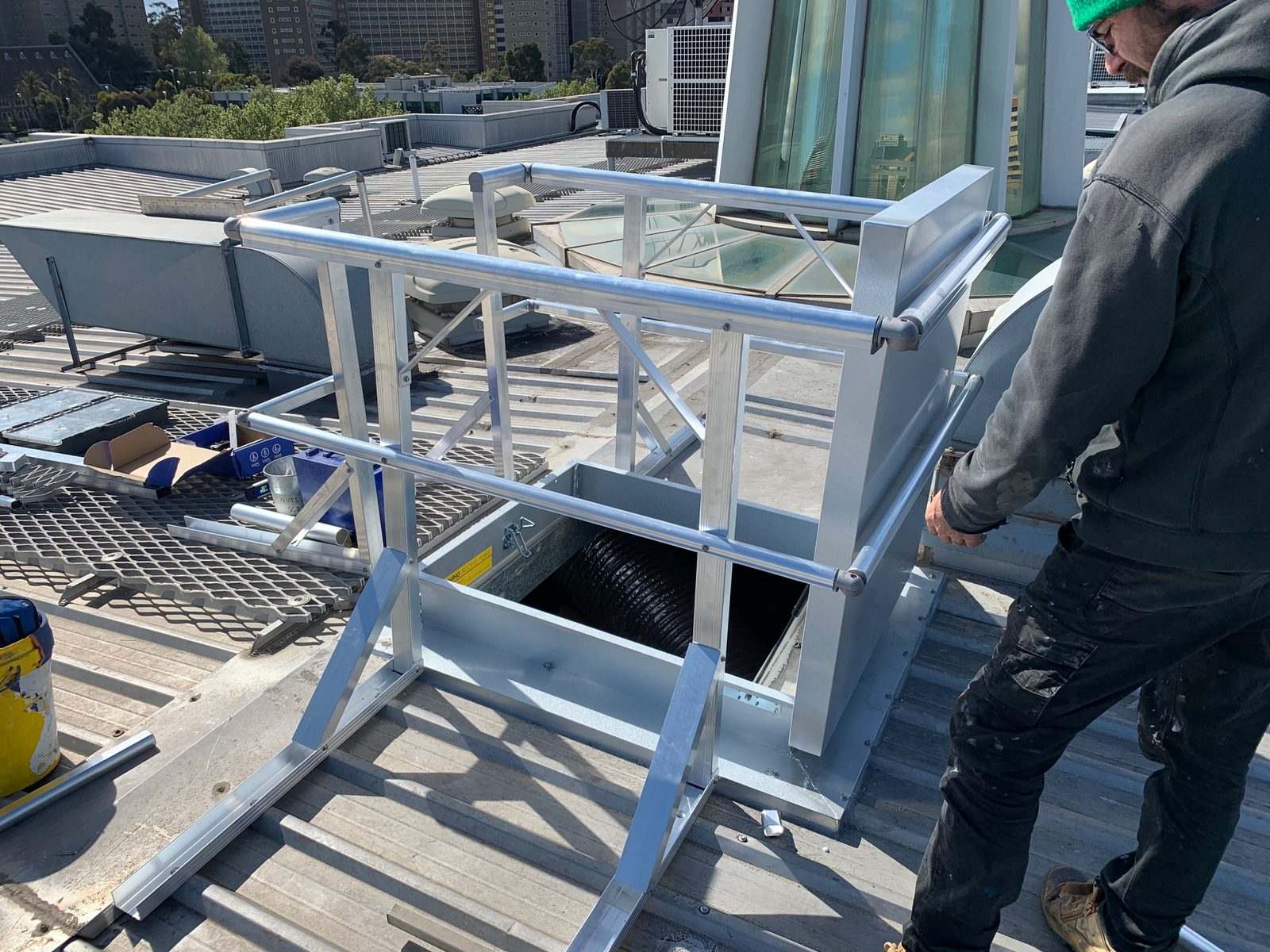 Mission Possible height safety guardrail system installed around a rooftop access hatch