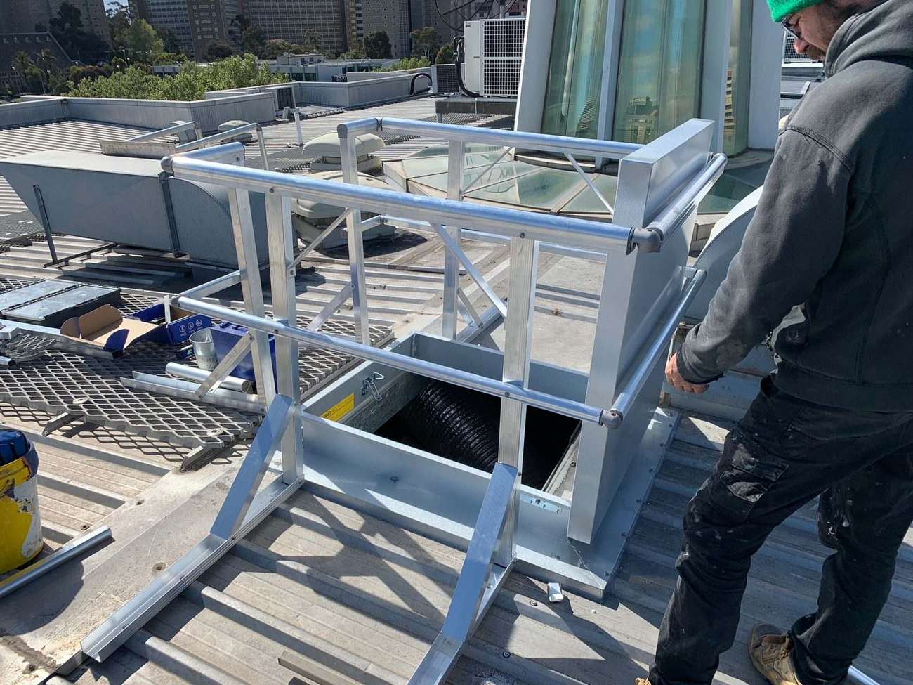 Mission Possible height safety guardrail system installed around a rooftop access hatch